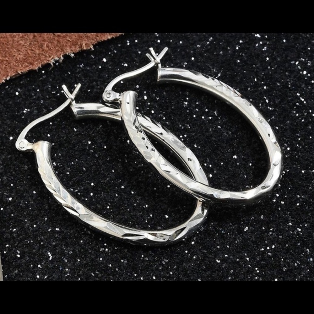 Diamond cut hoop earrings in sterling silver